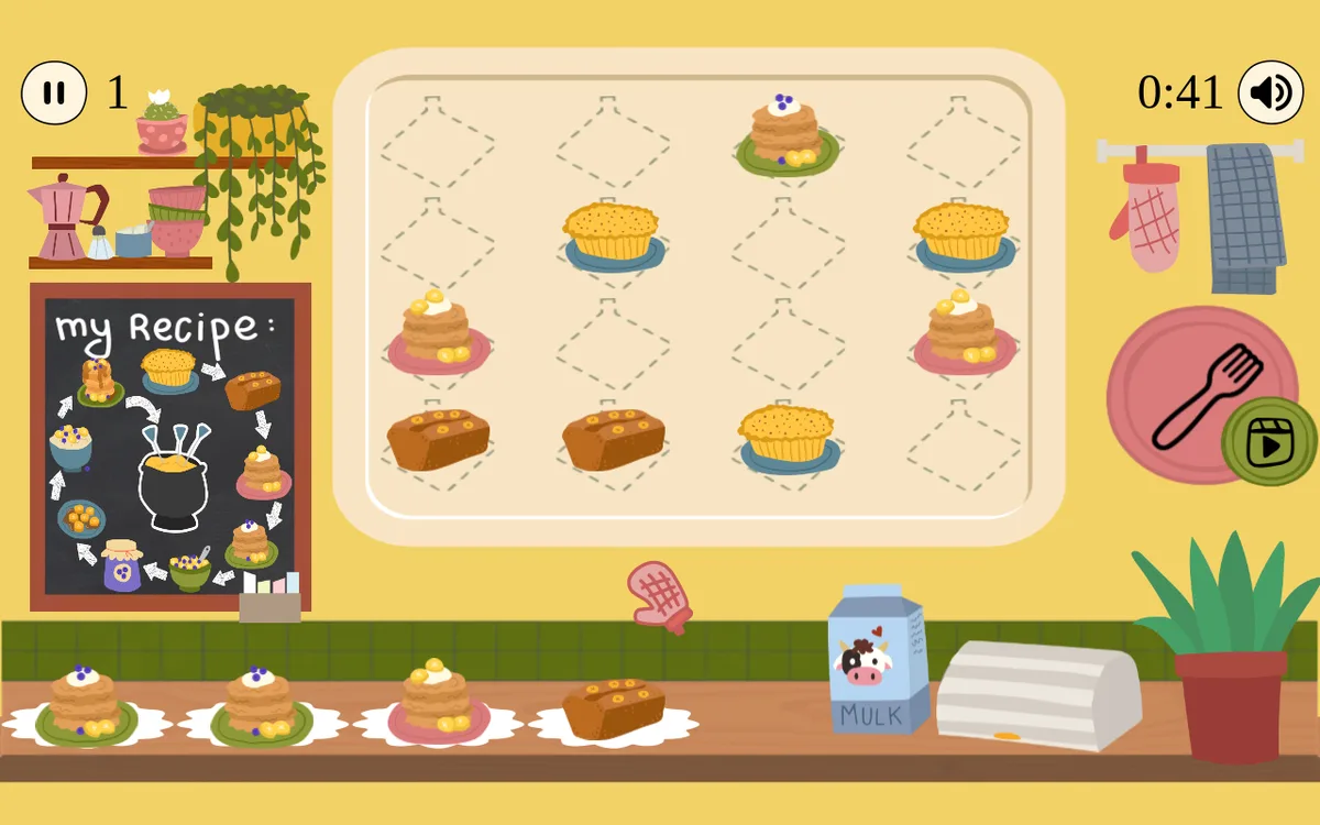 Two brown pieces side by side in the lower row of the kitchen tray