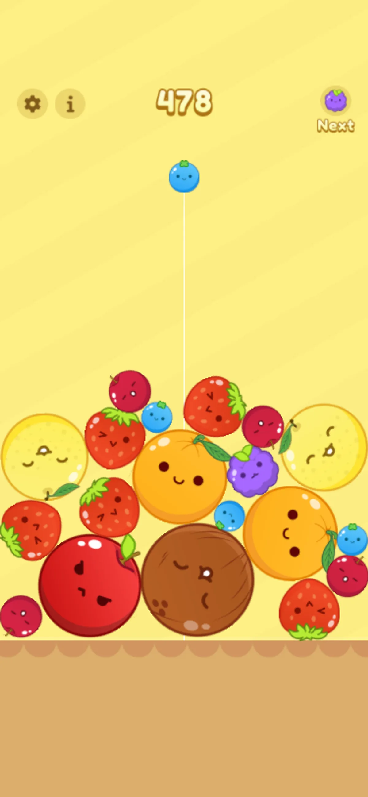Tall mixed-fruit pile at score 478 in the mobile viewport